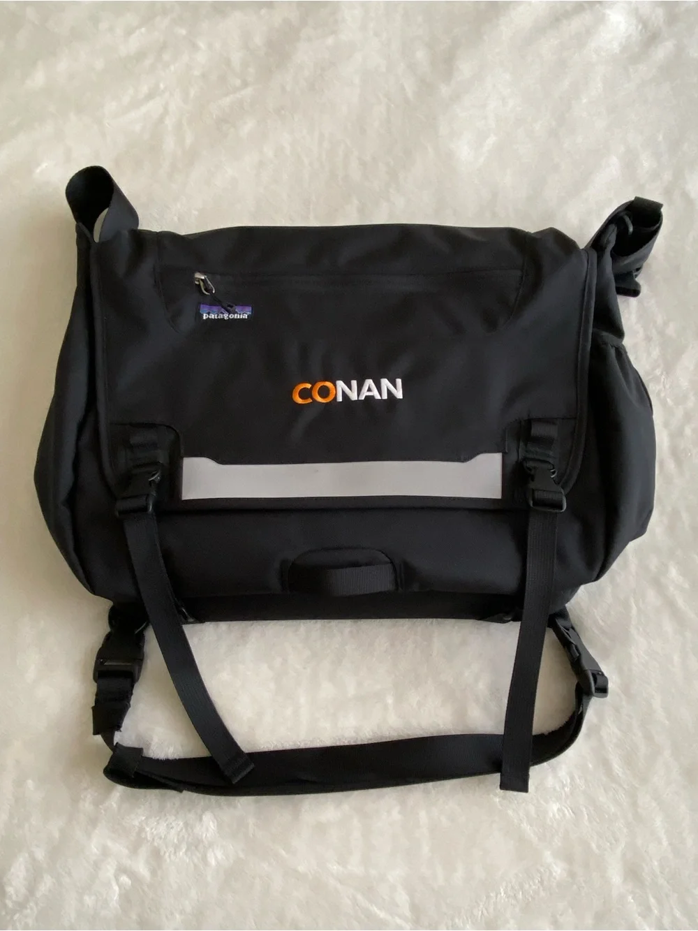 Patagonia Black Messenger Bag with Orange & White CONAN Embroidery